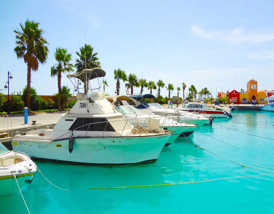 Private-style yacht and snorkeler in the Red Sea near Sharm El Sheikh