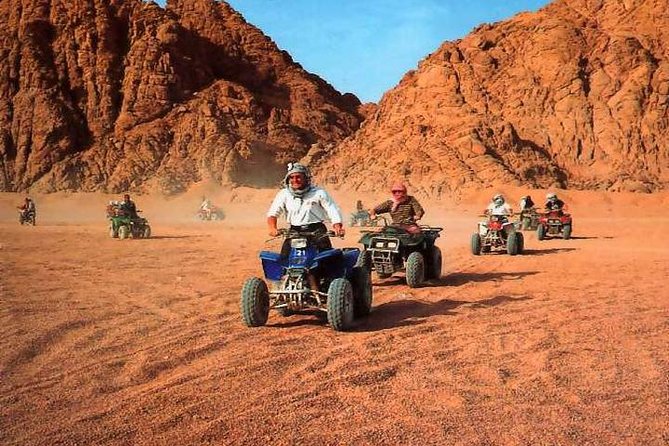 Quad-bike convoy crossing the Sinai Desert mountains near Sharm El Sheikh