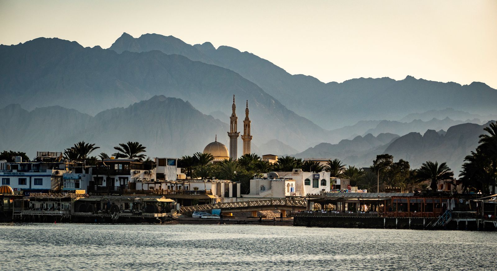 Sinai mountains rising behind a peaceful Red Sea coastal town